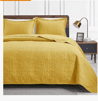 bed quilt yellow