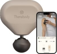 Theragun Mini percussive massage gun in hand